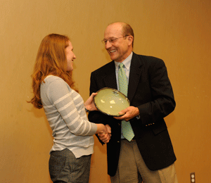 Photo of Amanda Gale receiving her award from Mike Kensler