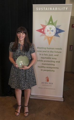 Photo of Carlie Bullock Jones with her Spirit of Sustainability Award.