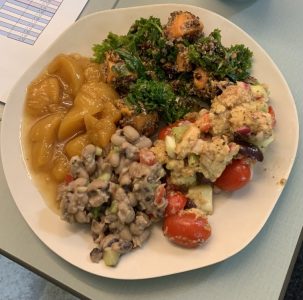 Plate of food served at the lunch held in place at the picnic