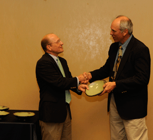 Photo of Award recipient Michael Hein receives his award from Mike Kensler, <a href=