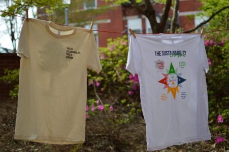 Photo of t-shirts on a clothesline.