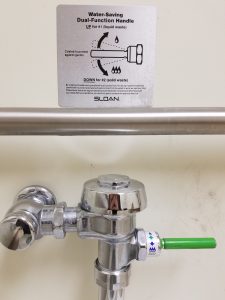 Dual-flush toilets lower water usage on campus. 