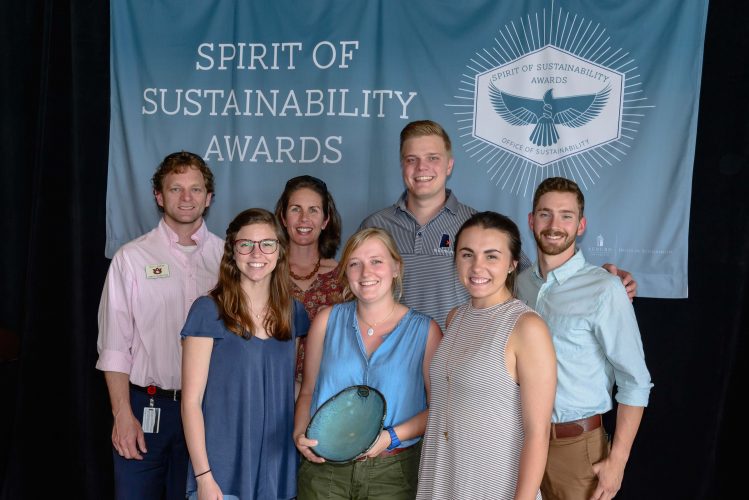 Photo of Auburn Outdoors staff accepting their award.