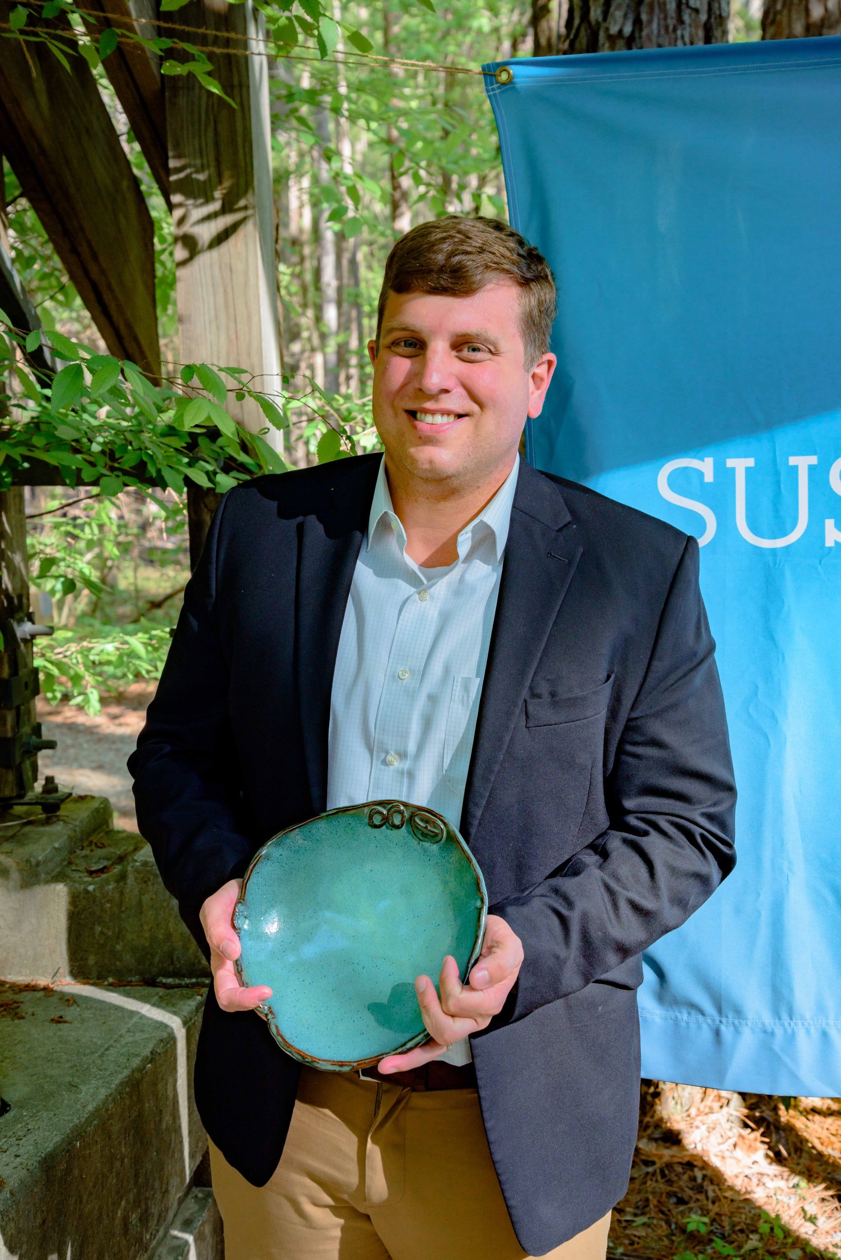Photo of Ben Burmester with his Spirit of Sustainability Award