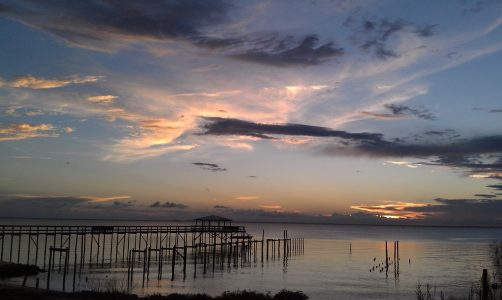 Sunset over the shore of Mobile Bay in Fairhope, Alabama