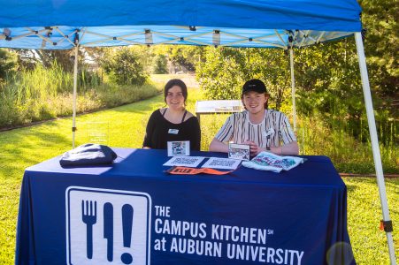 Photo of two students at the table for The Campus Kitchen