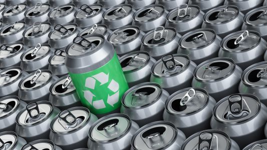 Image of aluminum cans with a recycling symbol on the cans.