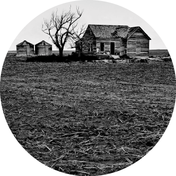 Black and white image of a rural home