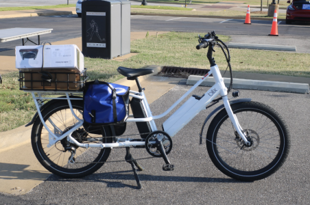 White electric bicycle on display at the event