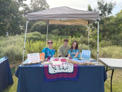 Photo of folks tabling for the study abroad Sustainability in Action: Fiji.