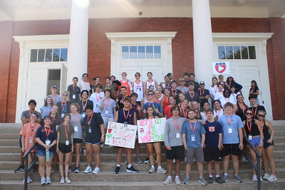 a large group of students outside langdon hall