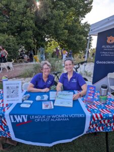 2 League of Women voters representatives tabling at the Auburn Sustainability picnic